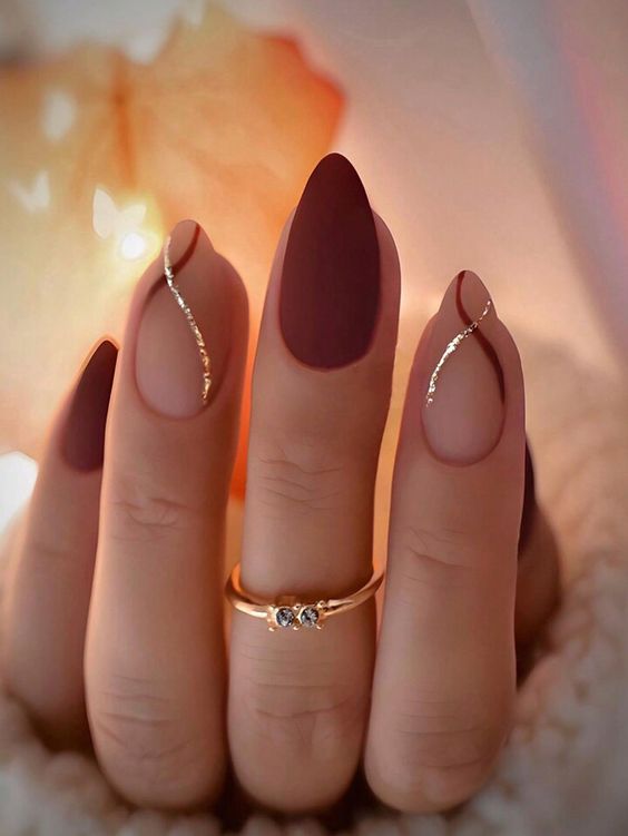 3. Elegant Burgundy and Nude Matte Nails with Subtle Gold Accents
